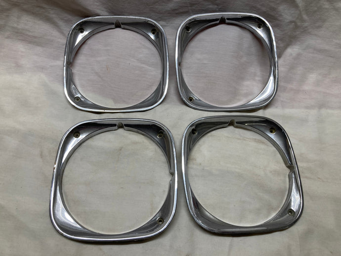 69 70 Grand Prix Headlight Bezels (Set of 4) (Used Original) 1969 1970